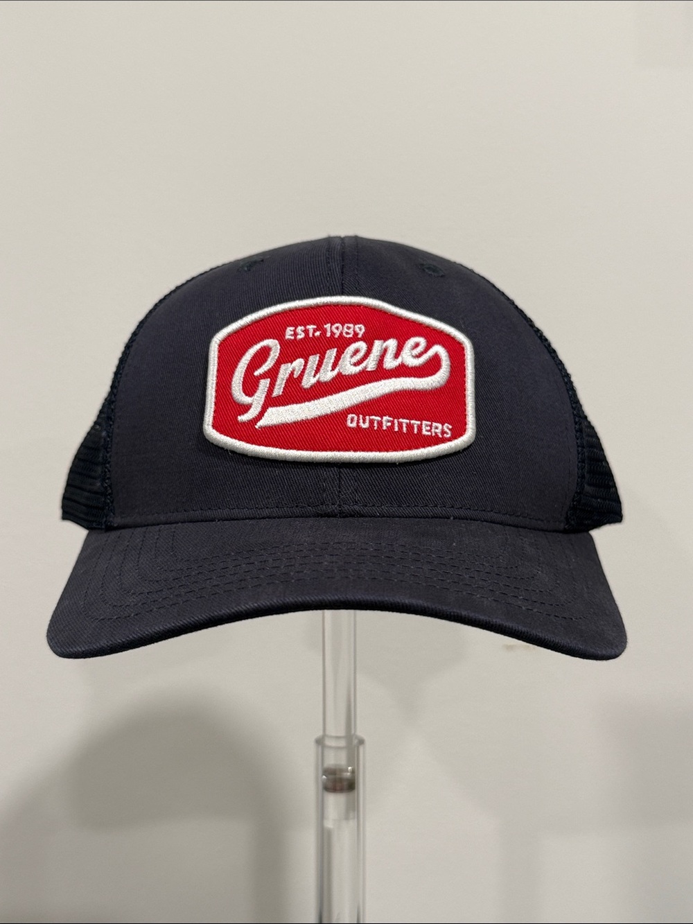 Gruene Navy Trucker Hat with Red Logo Patch